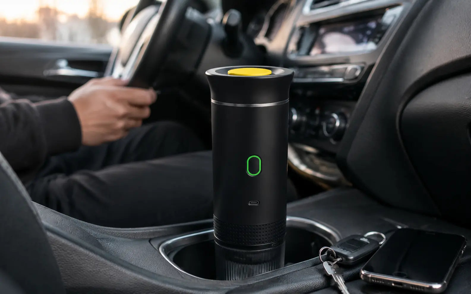 Black KOVA One in a car cupholder